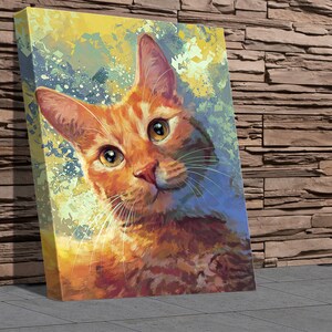 May include: A close-up portrait of a ginger cat with green eyes. The cat is looking directly at the viewer with a curious expression. The background is a colorful abstract painting with splashes of yellow, blue, and green.