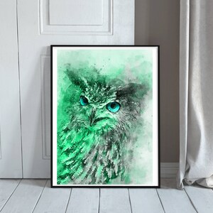 May include: A watercolour painting of an owl with bright blue eyes. The owl is rendered in shades of green and grey, with a soft, ethereal background.
