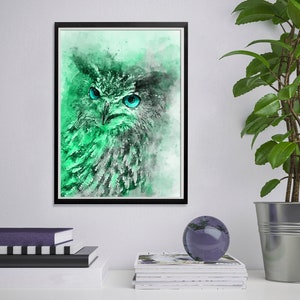 May include: A watercolour painting of an owl with bright blue eyes. The owl is rendered in shades of green and white, with a soft, ethereal background.