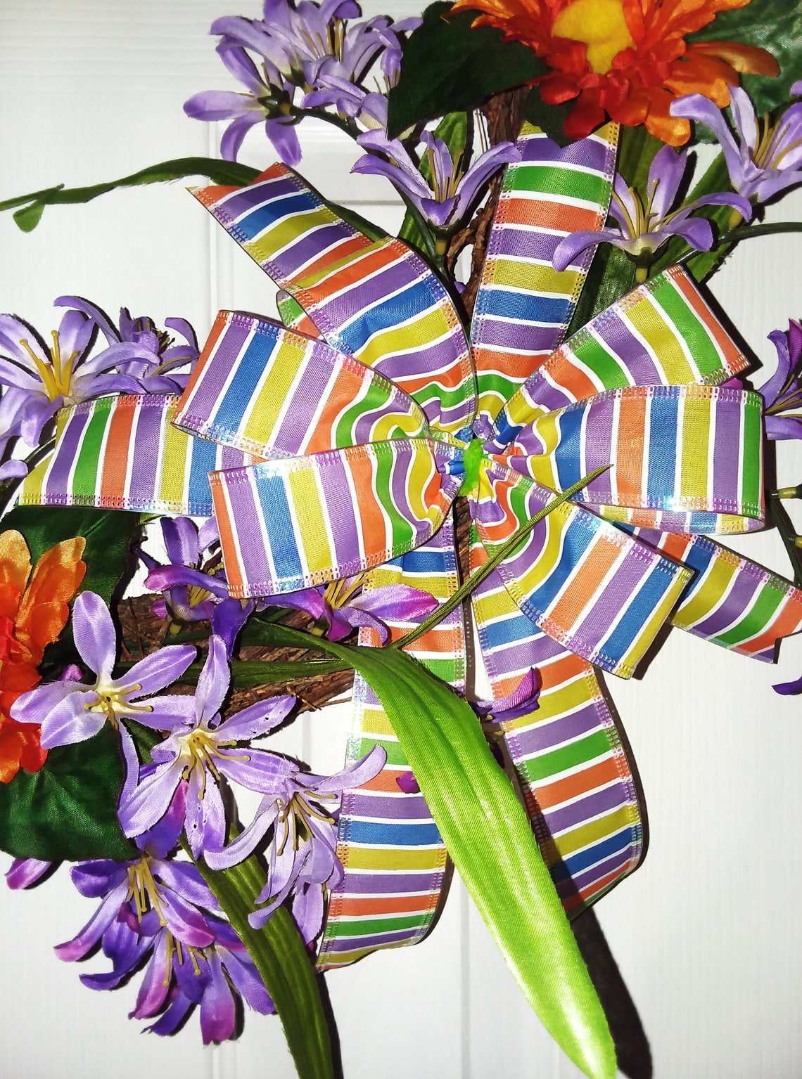 Grapevine Spring wreath with freesia and daisies grapevine