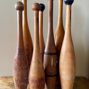 Collection of 7 Antique Juggling Exercise Clubs