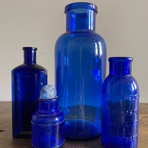 Four Antique Cobalt Bottles