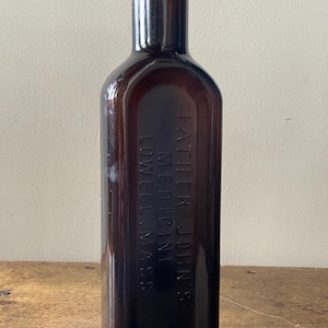 Antique Amber Bottle Father John’s