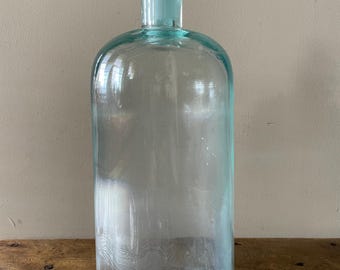 Antike blaue Apothekerflasche mit Stopfen
