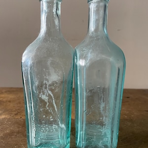 2 Antique Pinaud French Aqua Bottles
