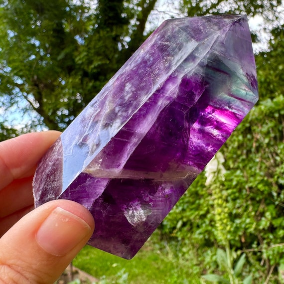 fluorite tower crystal, deep purple gemstone tower, candy stripe fluorite,  banded fluorspar point, green blue fluorite, purple green mineral