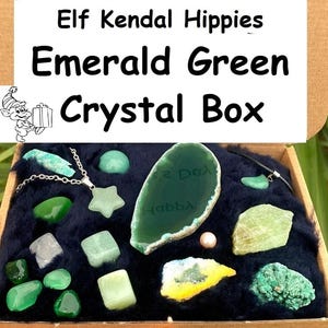 May include: A box filled with green crystals and a silver necklace with a star charm. The box is labeled "Elf Kendal Hippies Emerald Green Crystal Box".