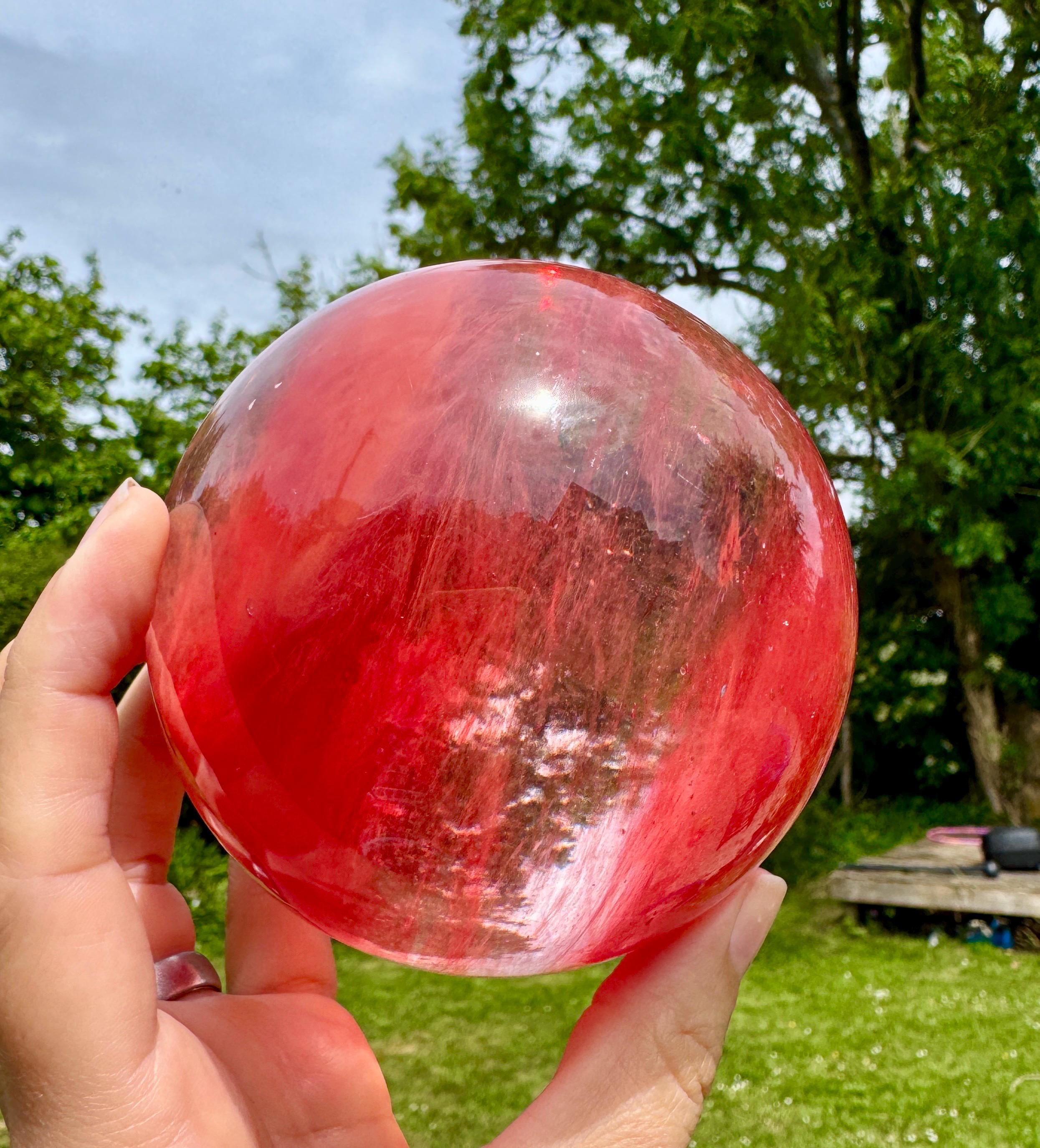 Christmas cherry Quartz sphere, the result of Cinnabar & Clear Quartz blended to make this enchanting Christmas wonderland crystal orb gift
