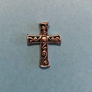 Ficha de cruz enrollada