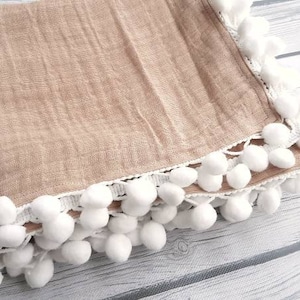 Pom pom swaddle blanket Tan gauze swaddle Neutral gender swaddle and blanket Baby shower gifts for a girl Baby accessories boy
