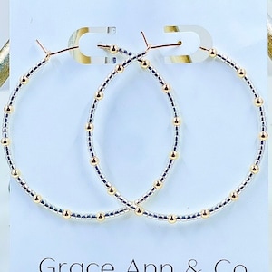 14k gold filled hoop earrings. Silver and gold beaded earrings.