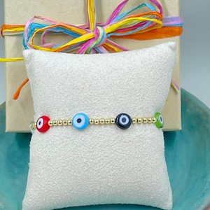 14k Gold filled evil eye stretch bracelet, great for stacking.