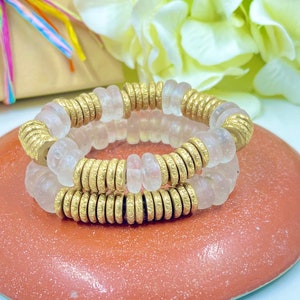 Beaded stacking bracelets, clear and brass African trade beads