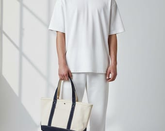 L.L.Bean kleine canvas boot- en draagtas met marineblauwe afwerking, gemaakt in de VS