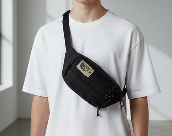 Vintage zwarte The North Face-heuptas / lendetas