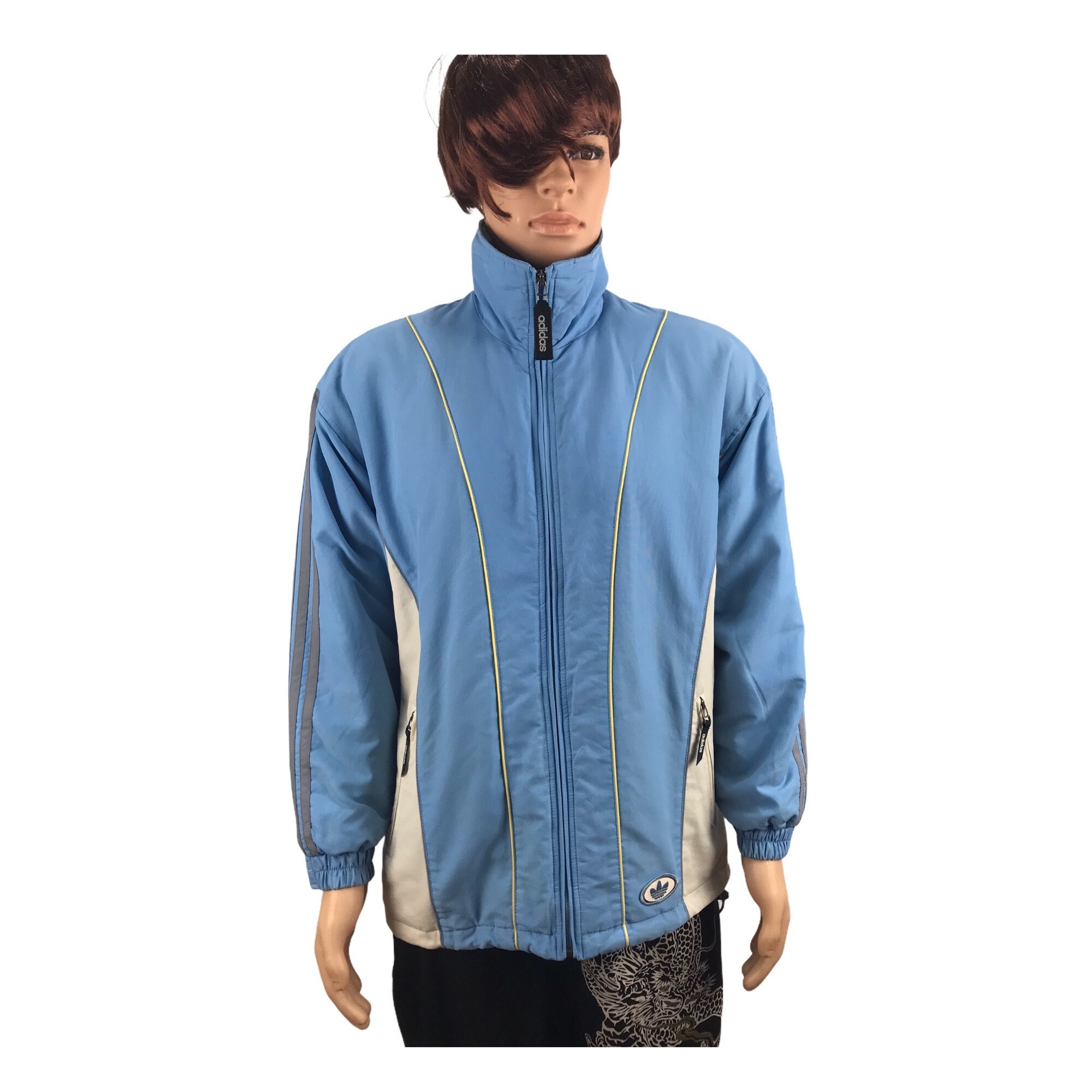 the brand with the 3 stripes jacket