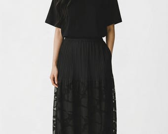 Falda plisada con bajo abullonado de Pleats Please Issey Miyake