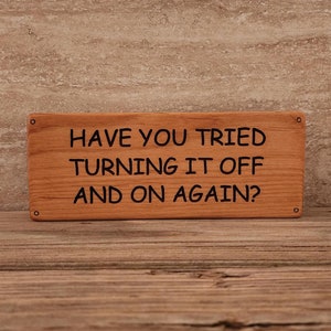 Have You Tried Turning It Off And On Again sign