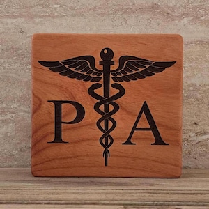 PA Caduceus laser engraved wood block