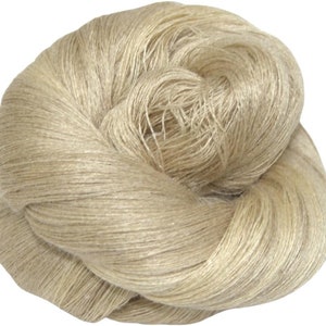 May include: A skein of natural beige linen yarn.