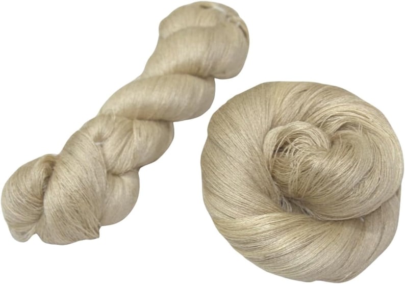 May include: Two skeins of natural colored linen yarn. One skein is twisted into a rope shape, the other is loosely coiled.
