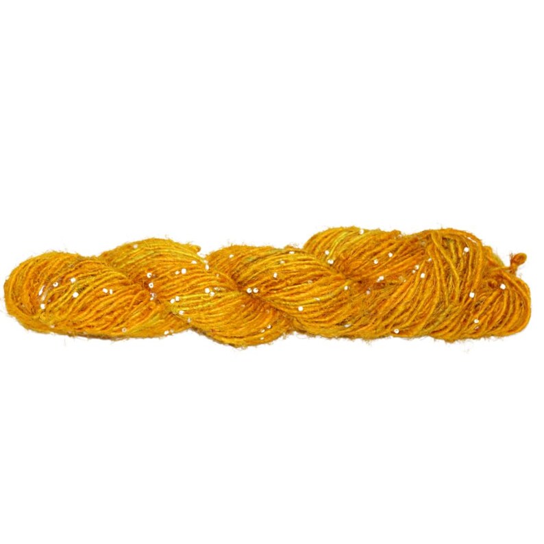 May include: A skein of yellow yarn with white sequins woven throughout.