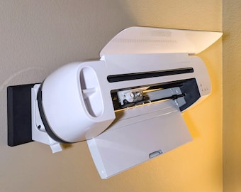 Soporte de pared para máquina de corte Cricut: ahorra espacio, es seguro, se puede quitar y se ajusta a presión.