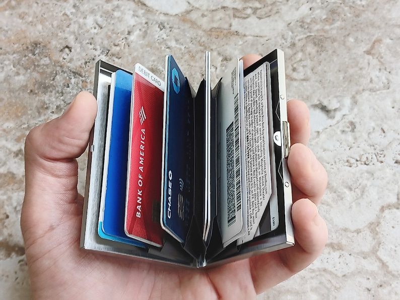 Open Stainless Steel Credit Card Holder to show card slots and cards inside