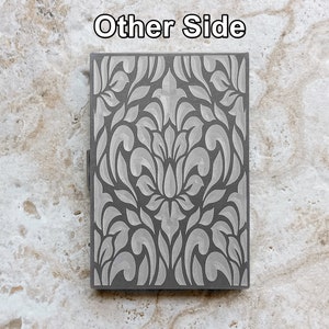 View of Floral Design on Engraved Stainless Steel Credit Card Case