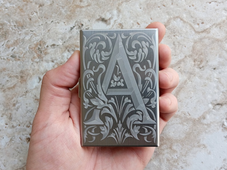 Stainless Steel Engraved Credit Card Case in Hand