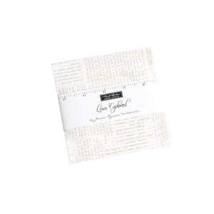 May include: A white fabric square with a beige print of text. The fabric is labeled "Linen Cupboard by Joanna Figueroa for Fig Tree & Co."