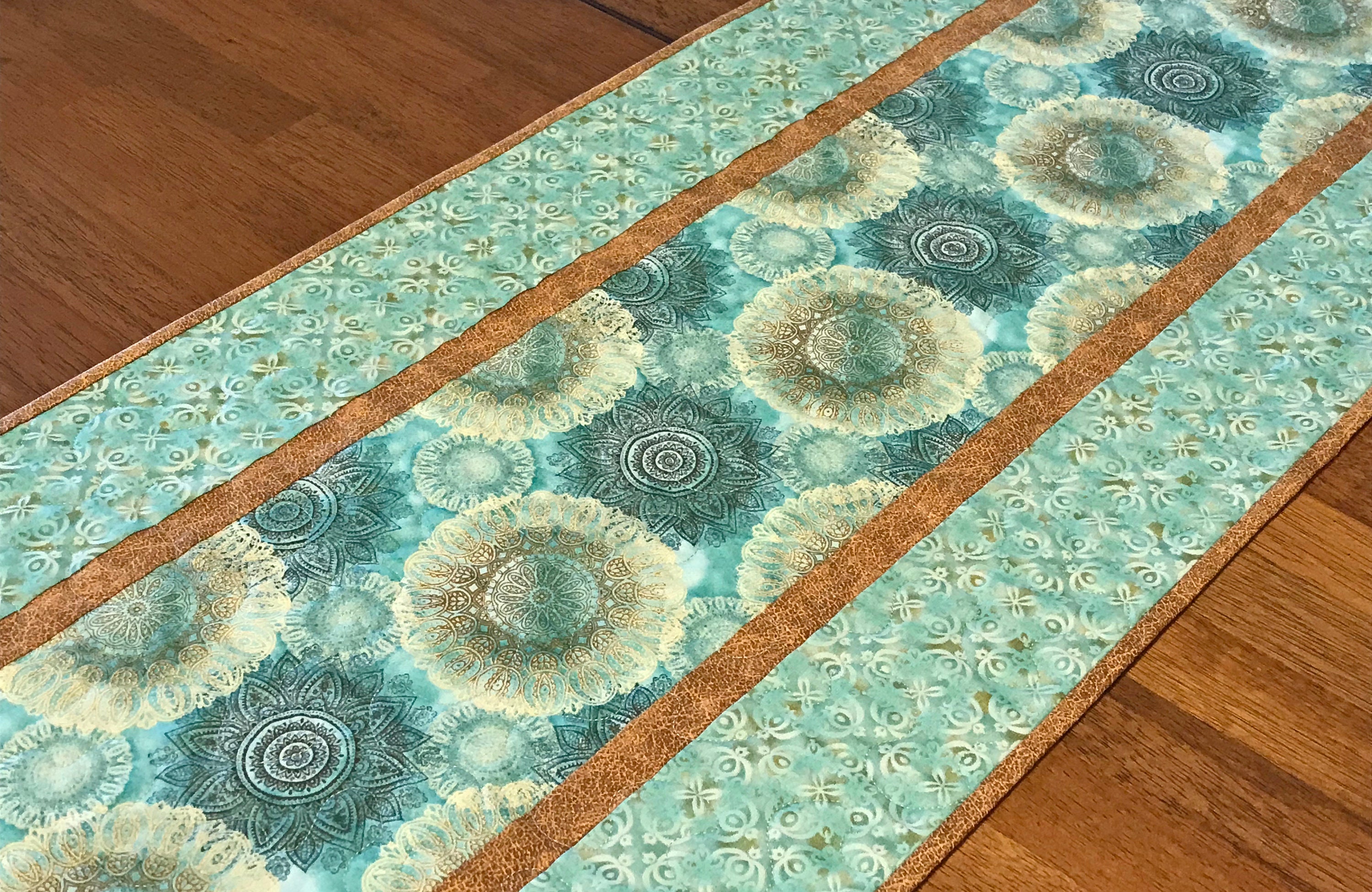 teal table runner and napkins