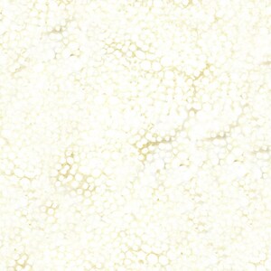 May include: A white background with a subtle pattern of small, light brown dots.