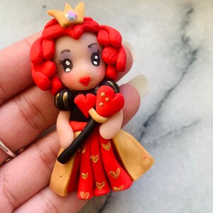 Figurer/dockor av polymerlera. Utsmyckningar/dekorationer/figurer med platta baksidor