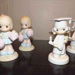 Choice Of 1980&#39;s Precious Moment&#39;s Figurines Cheerleader And Graduate 2 of Each Available