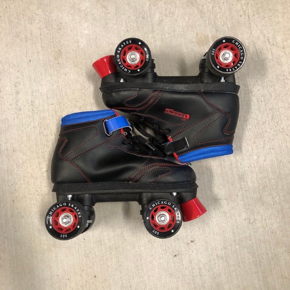 Black, blue and red Roller skates