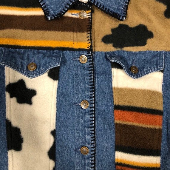 Cute Blue jean jacket with cow print details