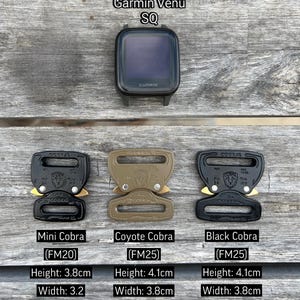 May include: A black Garmin Venu SQ smartwatch positioned above three metal Cobra buckles. The buckles are labeled Mini Cobra FM20, Coyote Cobra FM25, and Black Cobra FM25, with listed dimensions including heights of 3.8cm and 4.1cm, widths of 3.2cm and 3.8cm, and depths of 0.7cm.