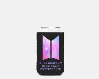 May include: Black can cooler featuring the text "BTS + ARMY = ♥" and the names of the band members. The design includes a purple and pink galaxy-themed logo with a heart. The cooler is designed to keep beverages cold.
