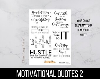 May include: A white sheet with black text featuring motivational quotes. Phrases include "Your limitation - it's only your imagination," "Dream wish do it," and "Hustle until you no longer need to introduce yourself." The text is in various fonts.