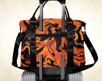 Pumpkin orange and black duffle bag, vivid overnight bag with strap and trolley sleeve, Marble effect with fall colors weekender bag