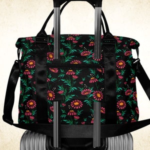 Rosa Gänseblümchen auf schwarzem Seesack, niedliche botanische Reisetasche mit Griffen Gurt und Trolleytasche, dunkle Blumen gemusterte Reisetasche Frauen