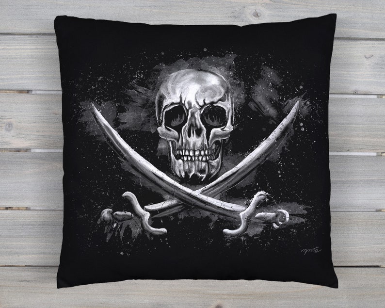 A black square throw pillow cover, printed with a black and white pirate skull, with crossed swords, as on the Jolly Roger pirate flag.