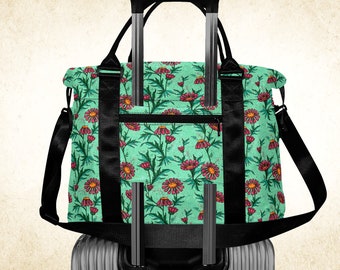 Pink daisies on mint green duffle bag, cute hippie travel bag with handles strap and trolley sleeve, floral patterned overnight bag women