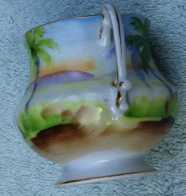 Small ceramic Japanese made vase and top