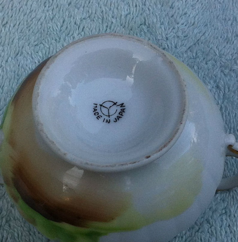 Small ceramic Japanese made vase and top