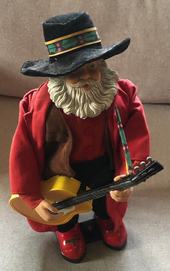 Swinging Cowboy Santa