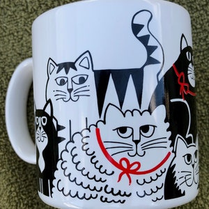 Nine Cat reunion mug