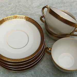 C H Field, GDA (Gerard , Dufraisseix & Abbo, Limoges, double handled cups and saucers