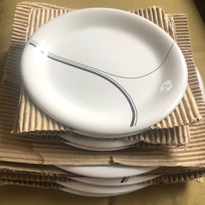Zip stoneware by Newcor dinner and salad plates, 4 of each